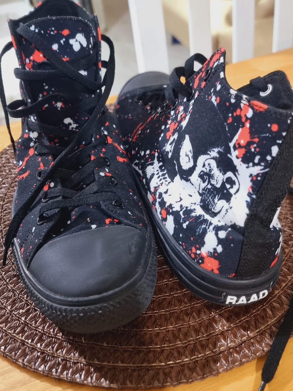 Raad Black High-Top Sneakers with Red & White Splatter and Skull Graphic